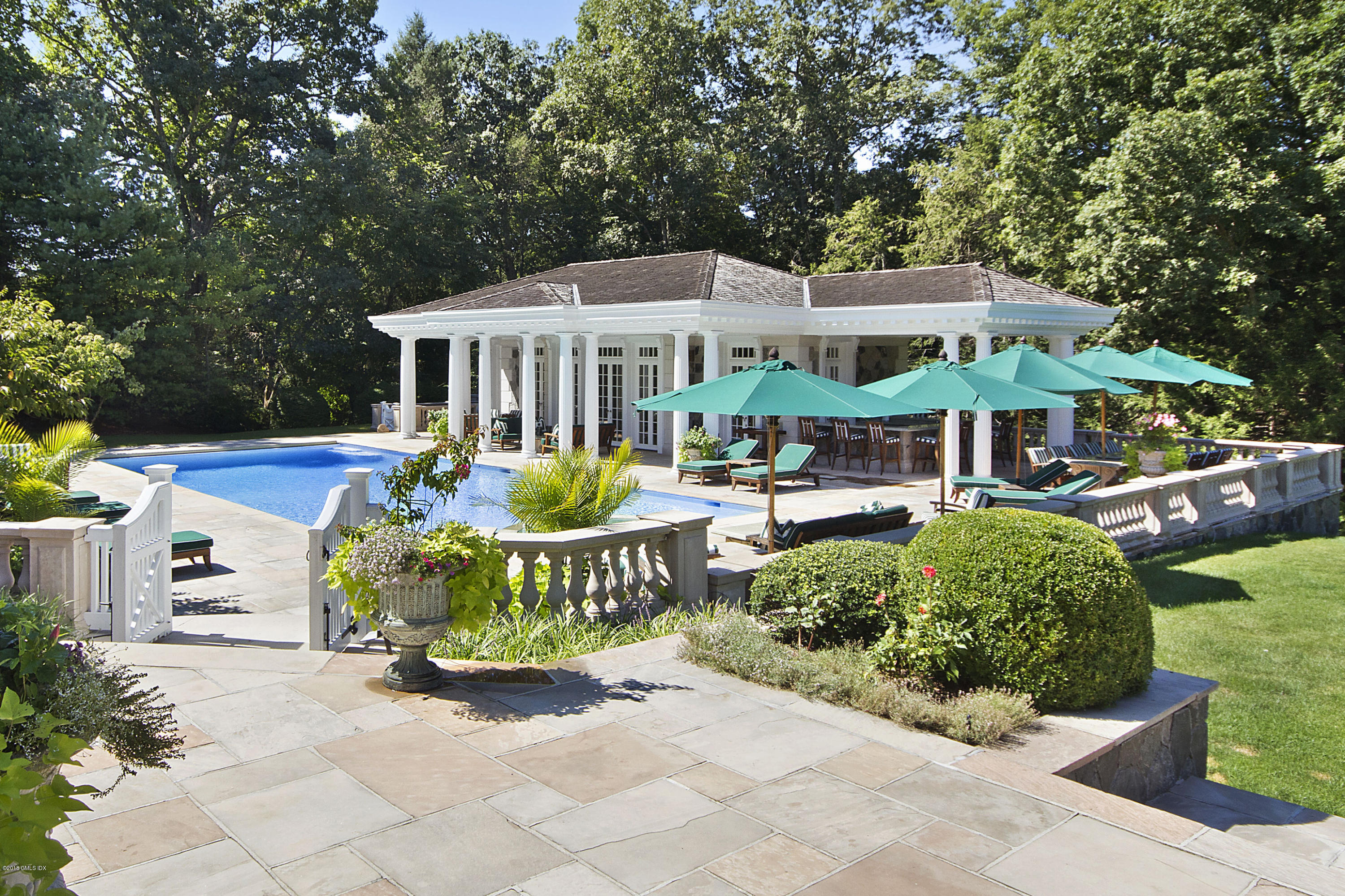 20 Andrews Farm Road Greenwich, CT 06831 - Photo 35 of 39 a front view of a house with garden