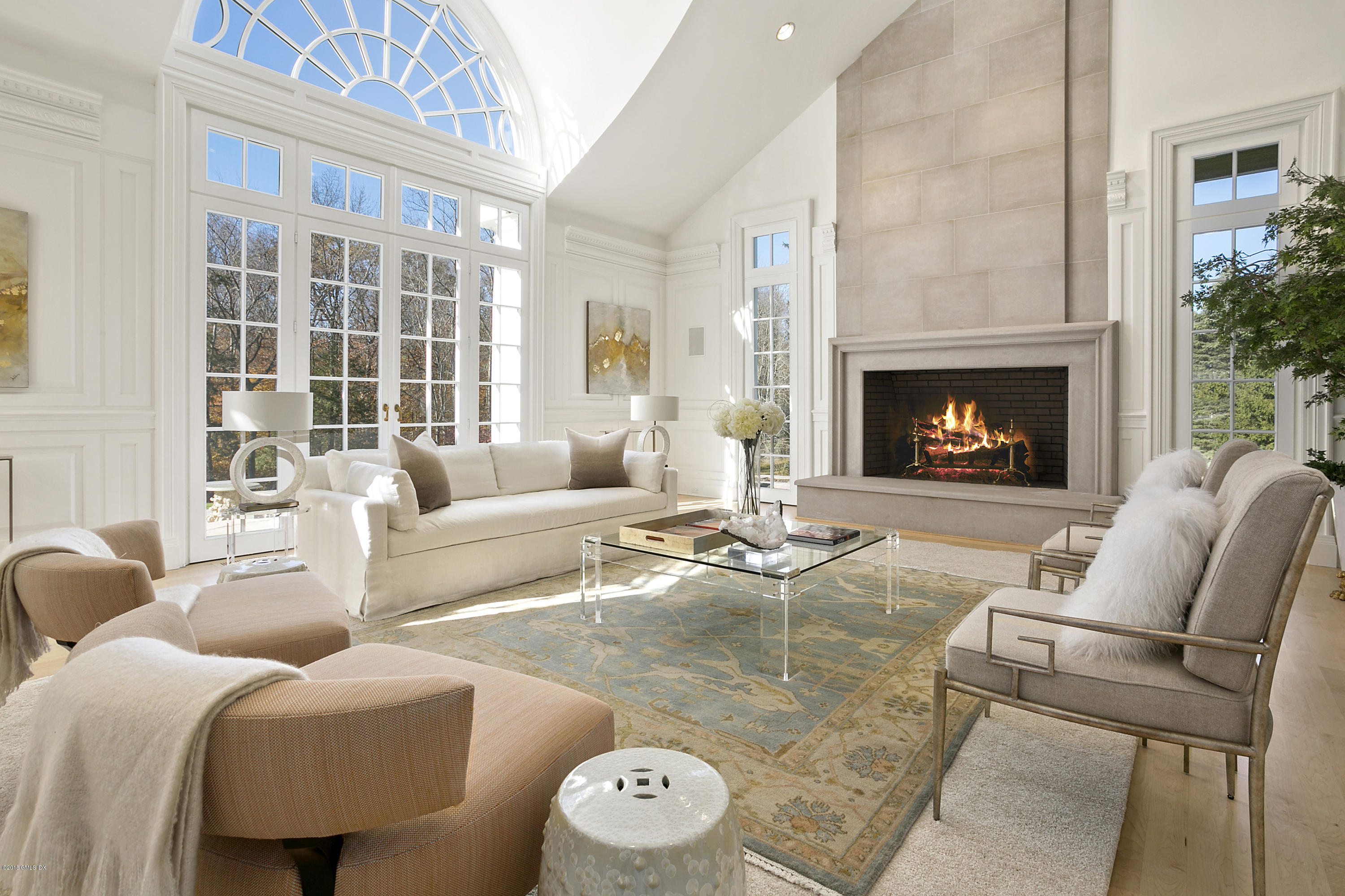 20 Andrews Farm Road Greenwich, CT 06831 - Photo 4 of 39 a living room with furniture and a fireplace