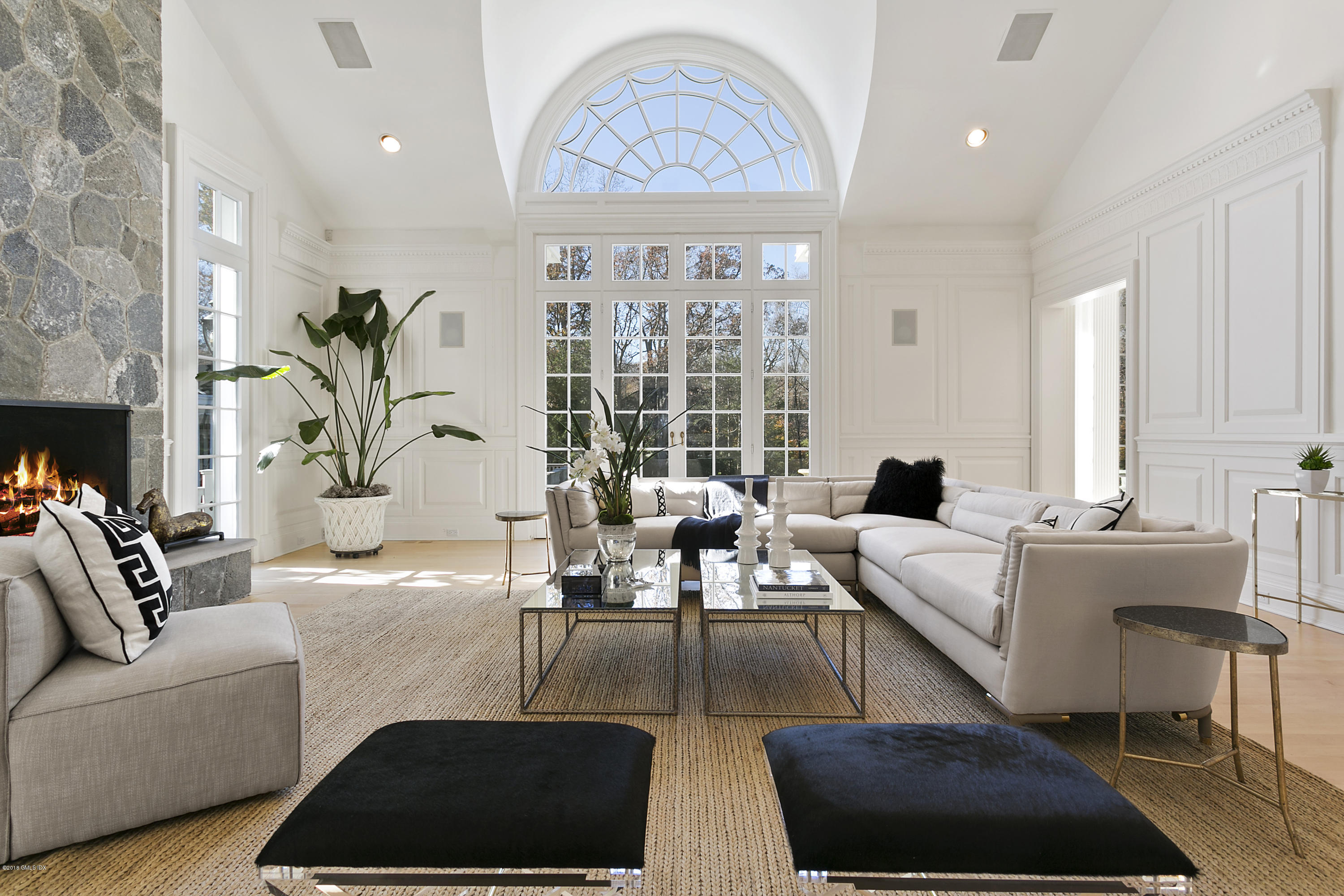 20 Andrews Farm Road Greenwich, CT 06831 - Photo 8 of 39 a living room with furniture large window and a table
