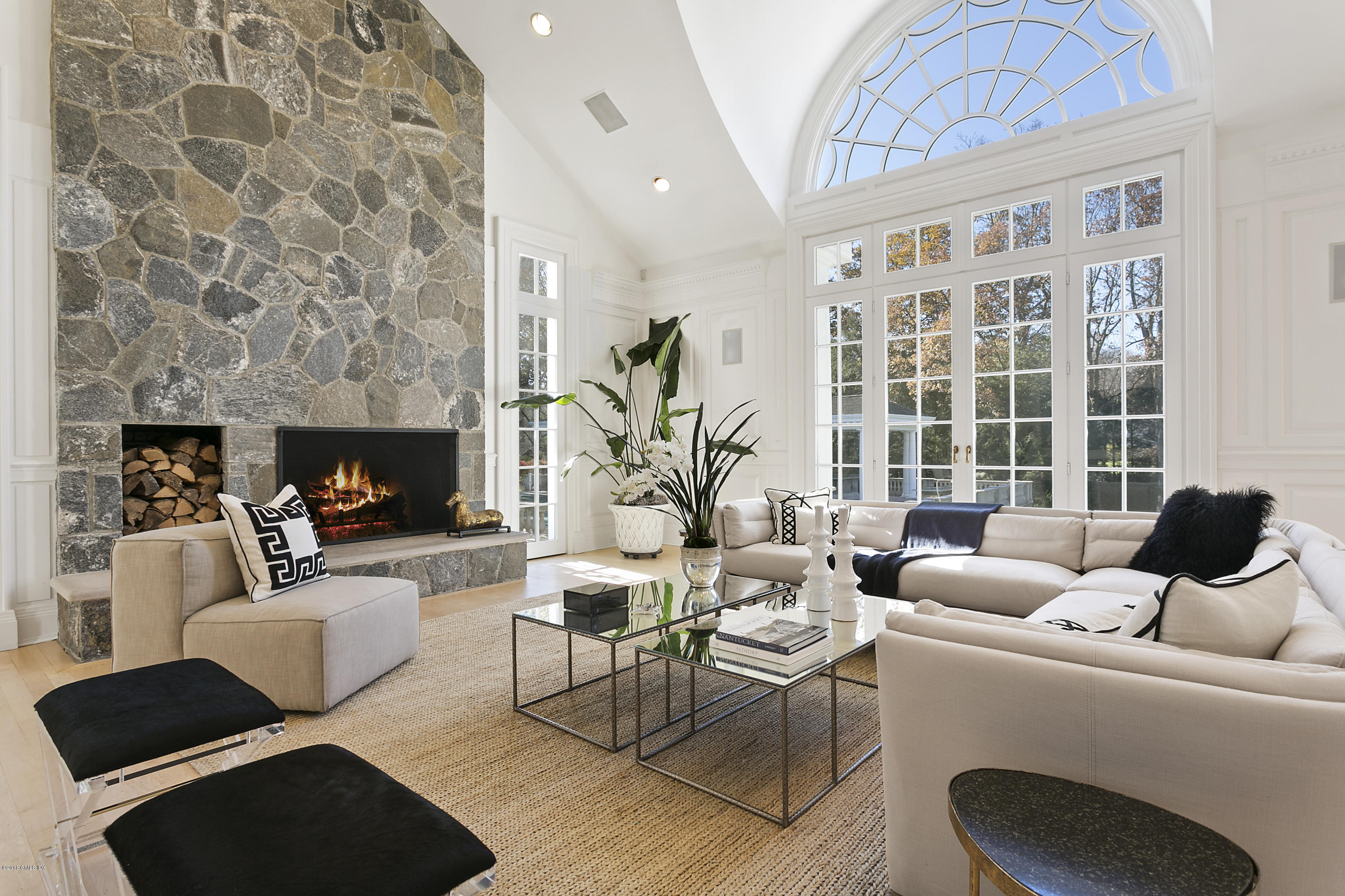 20 Andrews Farm Road Greenwich, CT 06831 - Photo 9 of 39 a living room with furniture and a fireplace