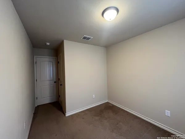 an empty room with closet
