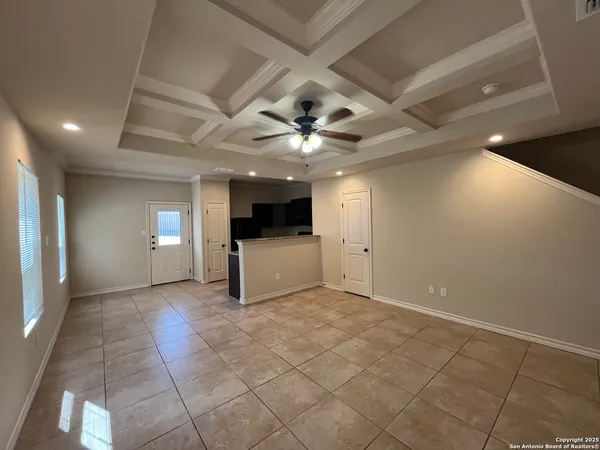a view of a livingroom with a kitchen