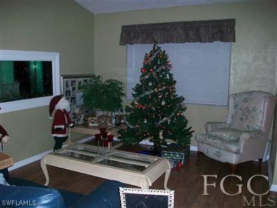 17464 Lee Road Fort Myers, FL 33967 - Photo 6 of 10 a living room with furniture and a potted plant