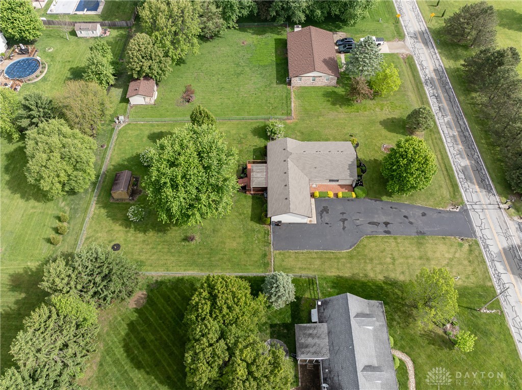 5709 Preble County Line Road Lewisburg, OH 45338 - Photo 43 of 47 An aerial view captures the property's expansive green landscape and well-maintained grounds.