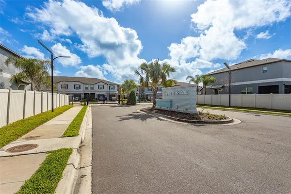 a view of street with parked cars