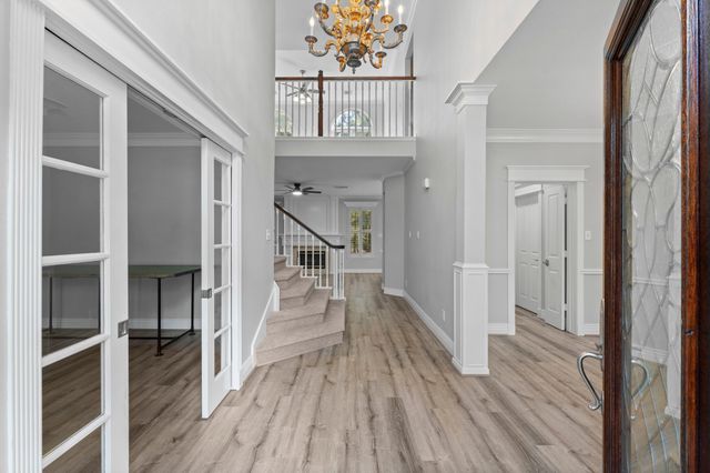 a view of entryway with wooden floor