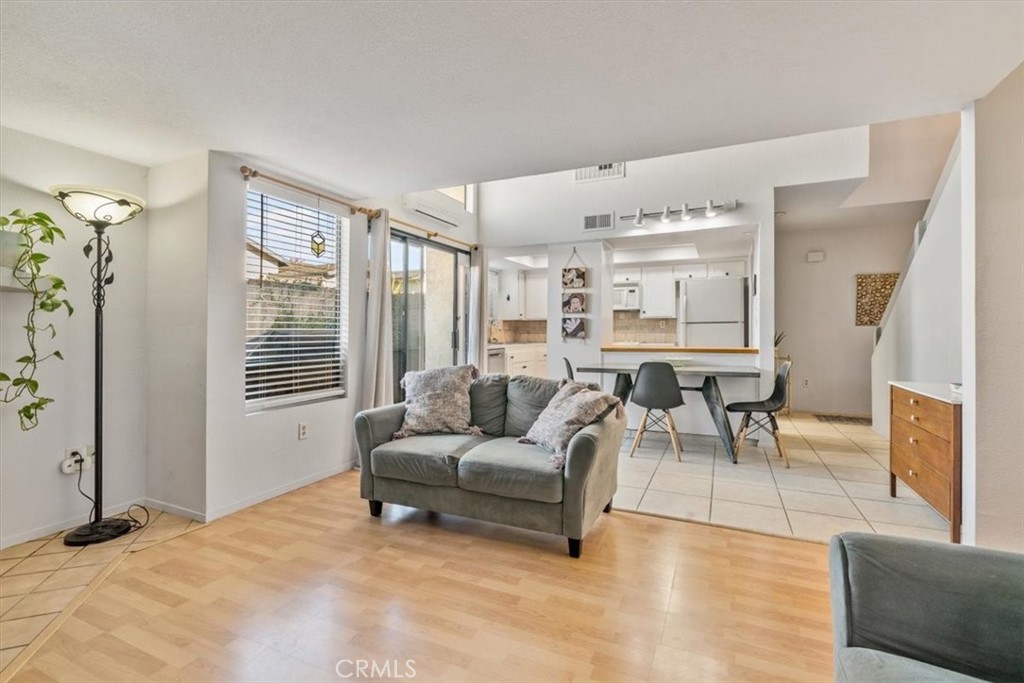 284 Spruce Street Arroyo Grande, CA 93420 - Photo 11 of 31 a living room with furniture and a large window