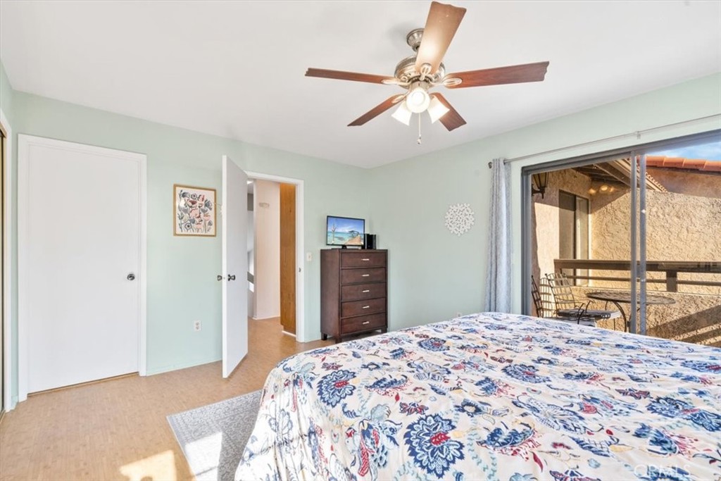 284 Spruce Street Arroyo Grande, CA 93420 - Photo 16 of 31 a bedroom with a large bed and a large mirror