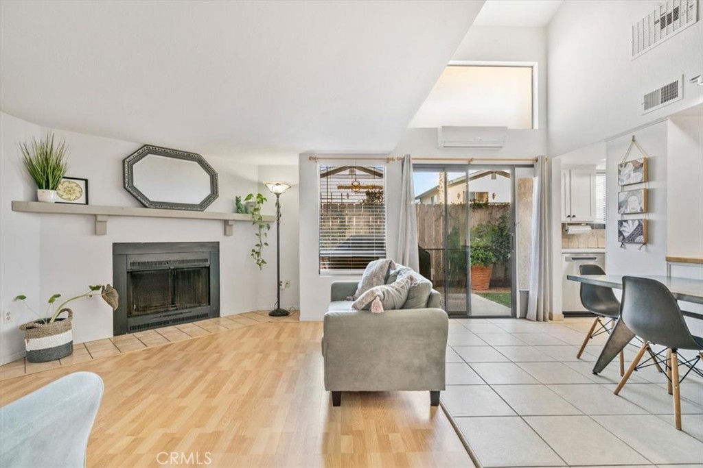 284 Spruce Street Arroyo Grande, CA 93420 - Photo 2 of 31 a living room with furniture and a fireplace