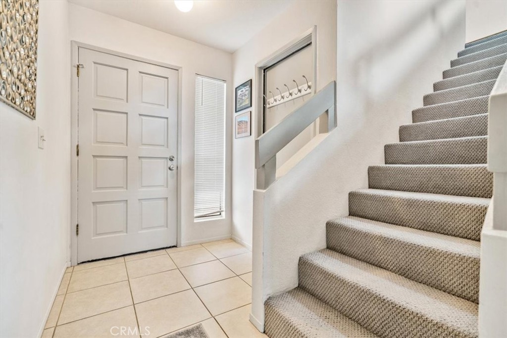 284 Spruce Street Arroyo Grande, CA 93420 - Photo 6 of 31 a view of staircase with white walls