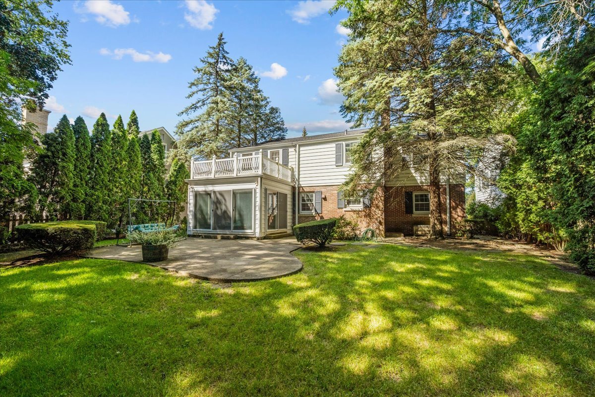 912 Pontiac Road Wilmette, IL 60091 - Photo 22 of 25 a view of a house with a yard