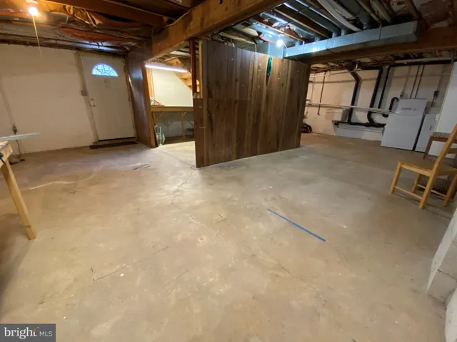 a view of a room with wooden walls