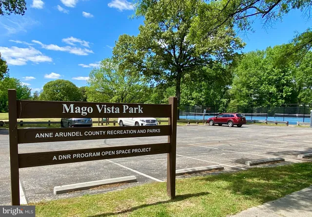 a view of a street with sign board