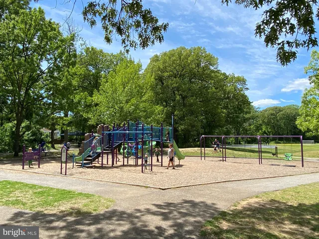 a view of a park with swings