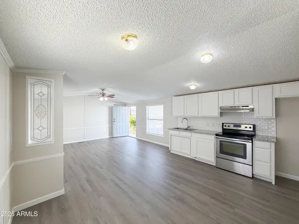 a view of a bathroom from the hallway