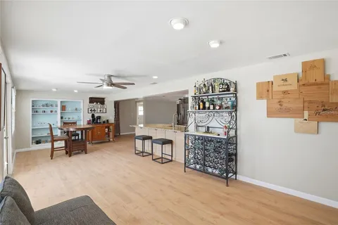 a view of a livingroom with furniture and window