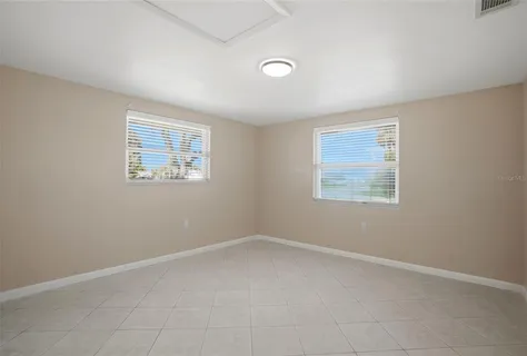 an empty room with windows