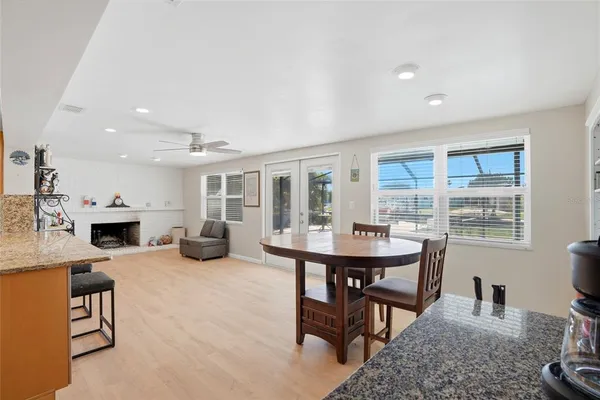 a view of a dining room with furniture window and outside view