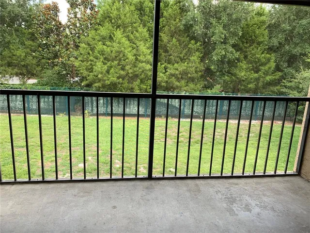 a view of a street from a balcony