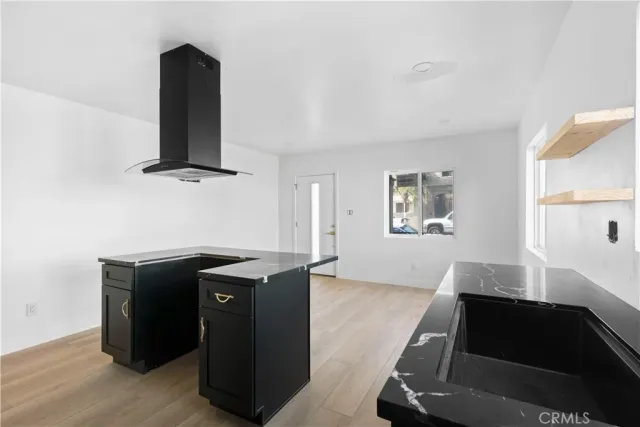 a view of workspace with wooden floor