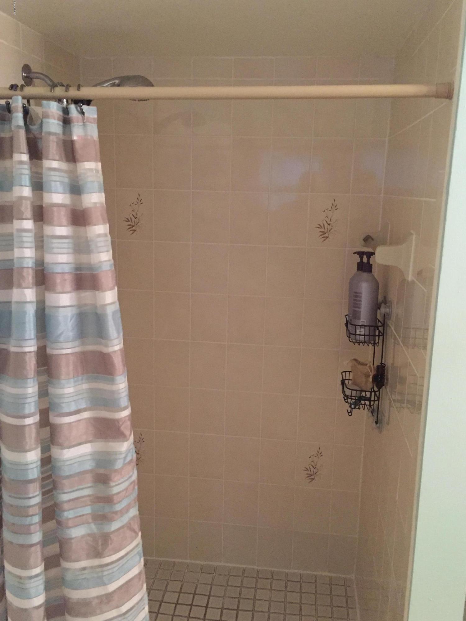 5330 Holden Road Cocoa, FL 32927 - Photo 18 of 23 a bathroom with a shower