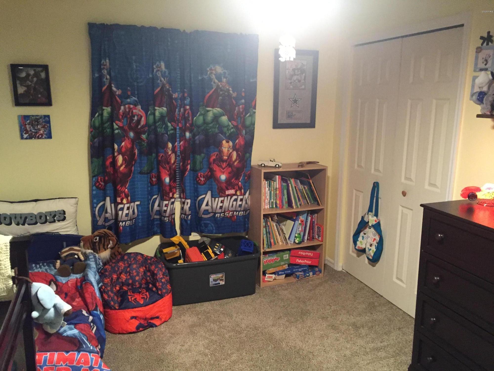5330 Holden Road Cocoa, FL 32927 - Photo 19 of 23 a room with lots of books and a large mirror