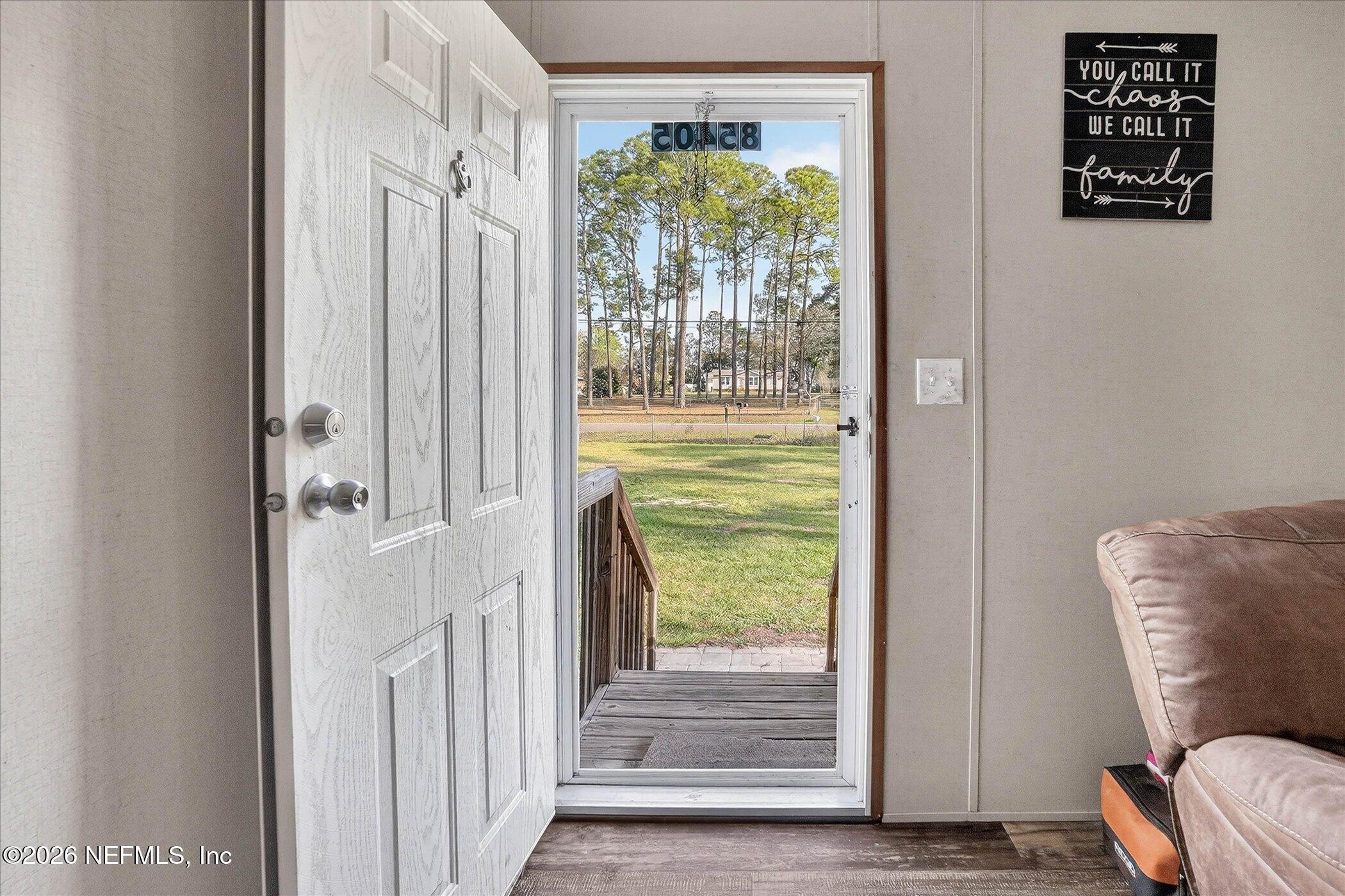 85405 Blackmon Road Yulee, FL 32097 - Photo 2 of 27 a living room with furniture and a window