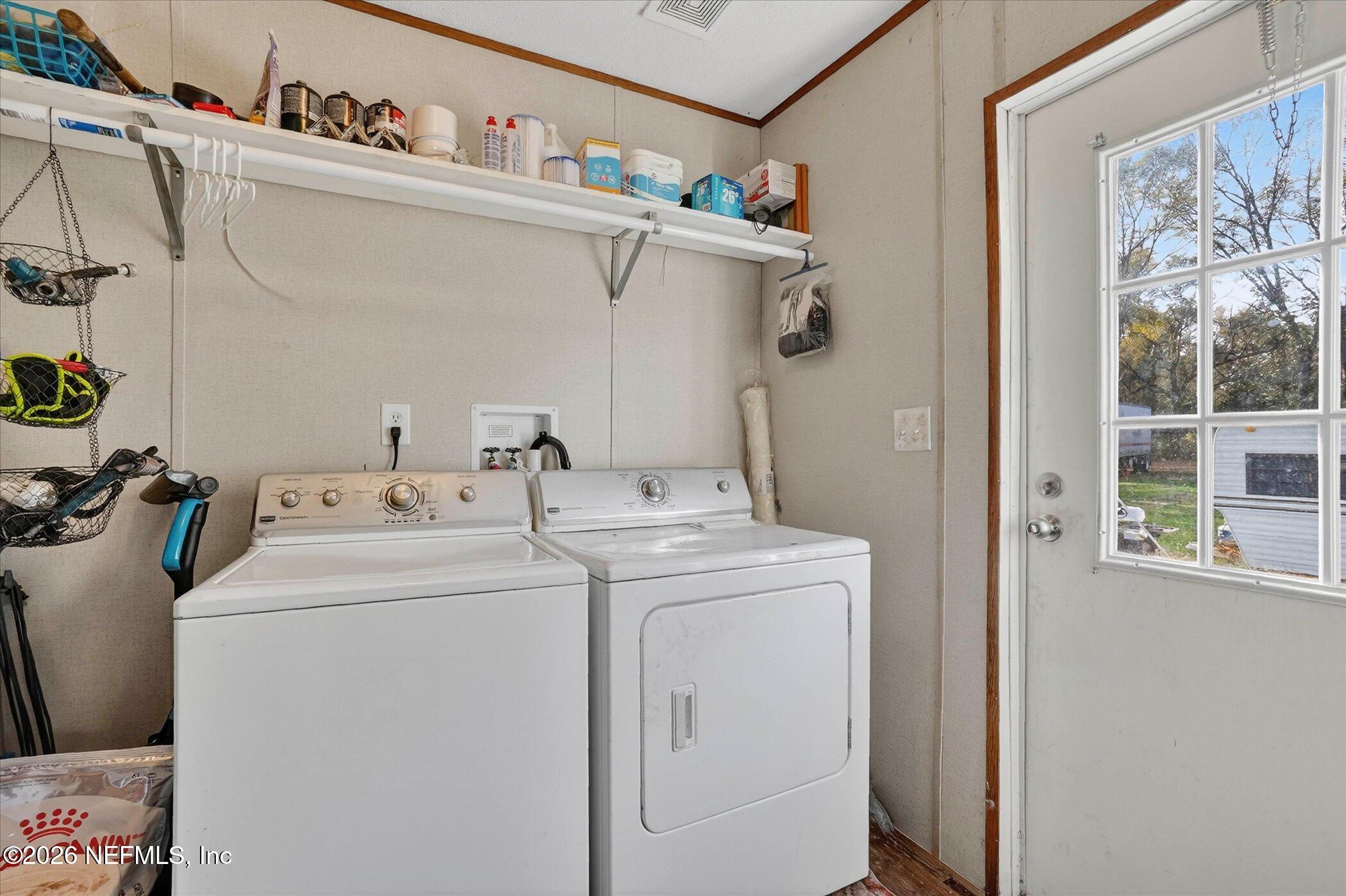 85405 Blackmon Road Yulee, FL 32097 - Photo 21 of 27 a utility room with dryer and washer