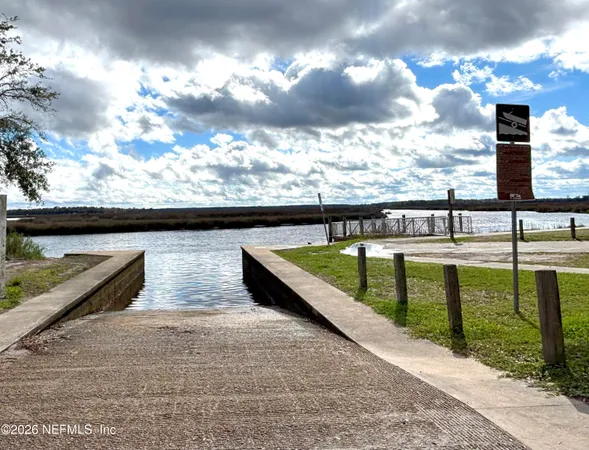 a view of swimming pool with seating