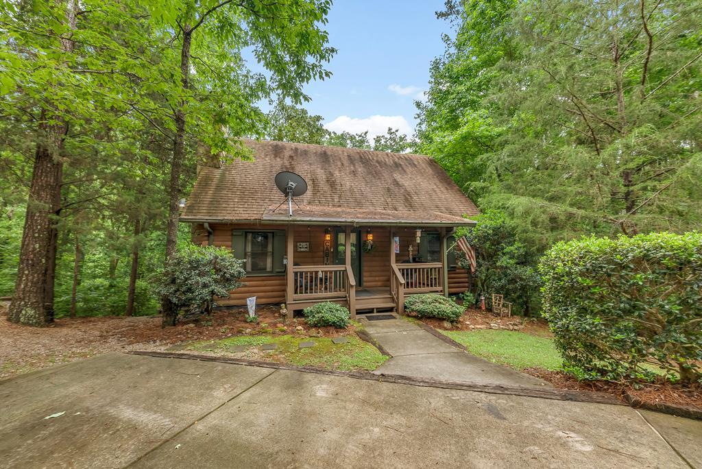 149 Mountain Springs Road Warm Springs, GA 31830 - Photo 2 of 43 a view of a house with a yard