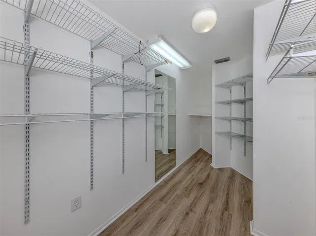 a view of a swimming pool with a yard