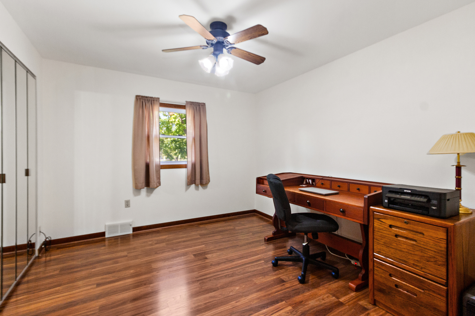 23765 South Loomis Street Crete, IL 60417 - Photo 20 of 23 a view of a workspace with furniture and a window