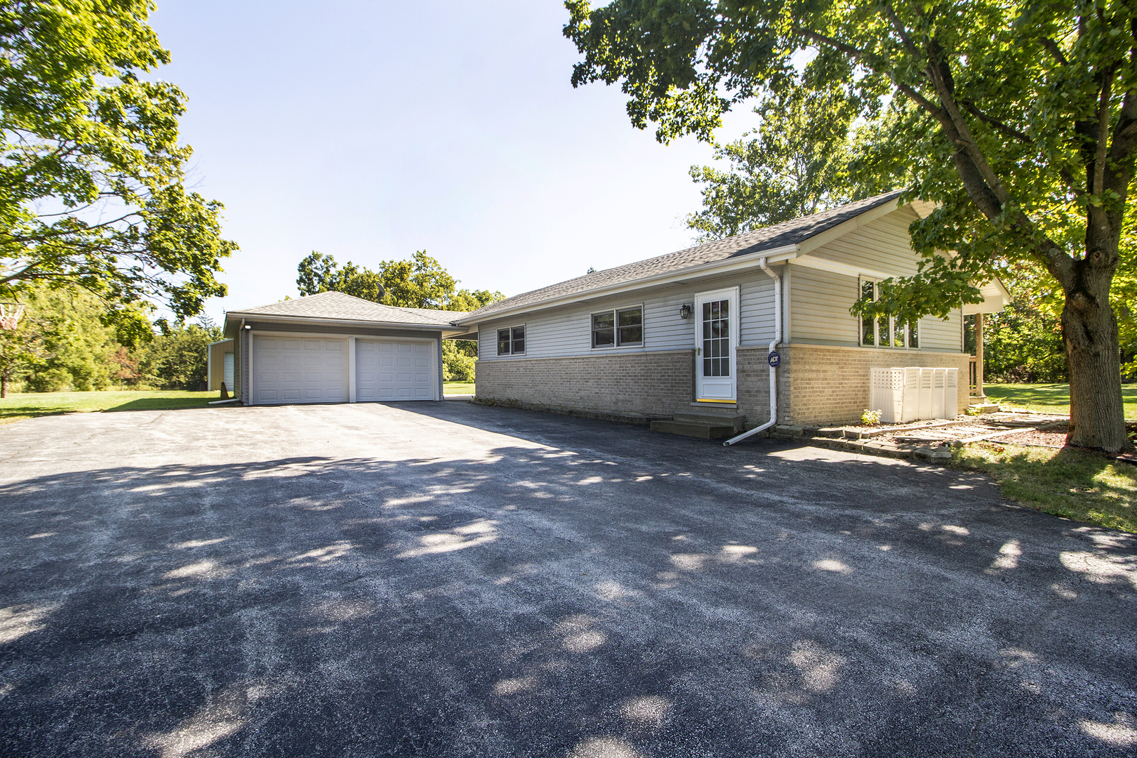 23765 South Loomis Street Crete, IL 60417 - Photo 2 of 23 a view of a house with a yard