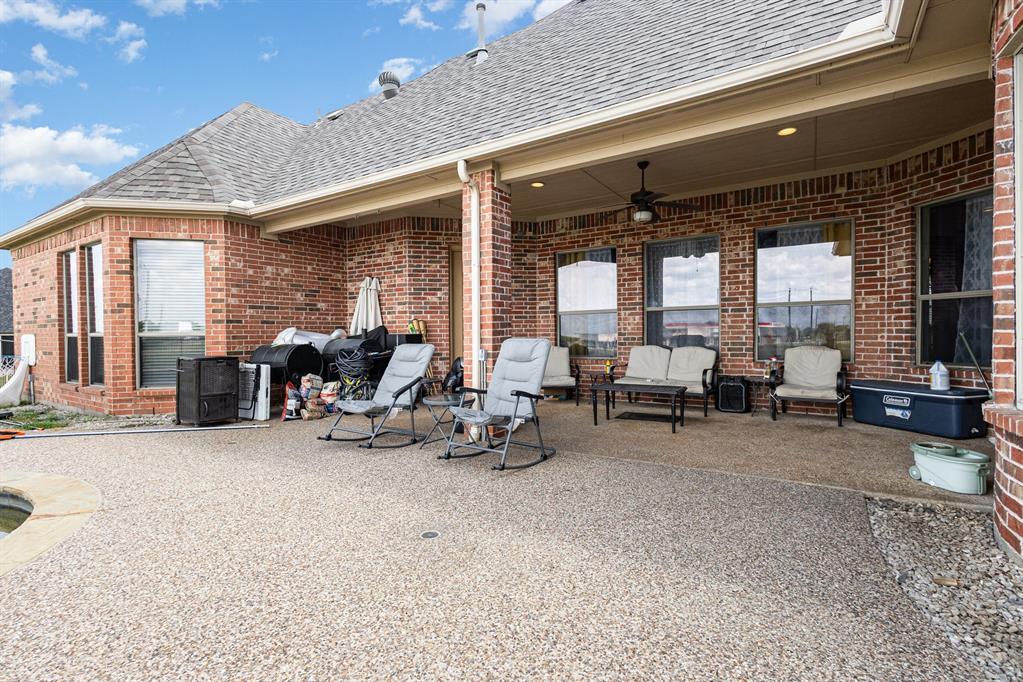 123 Ranch House Road Rockwall, TX 75032 - Photo 18 of 23 a view of a room with gym equipment