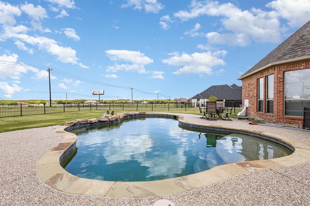 123 Ranch House Road Rockwall, TX 75032 - Photo 3 of 23 a view of a swimming pool with outdoor seating