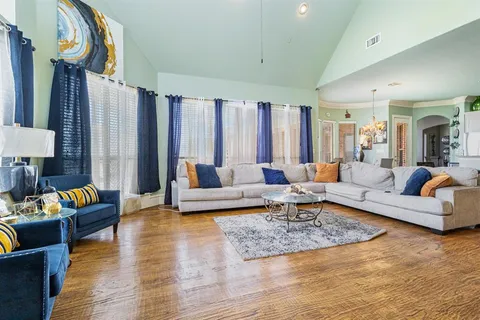 a living room with furniture and a couch