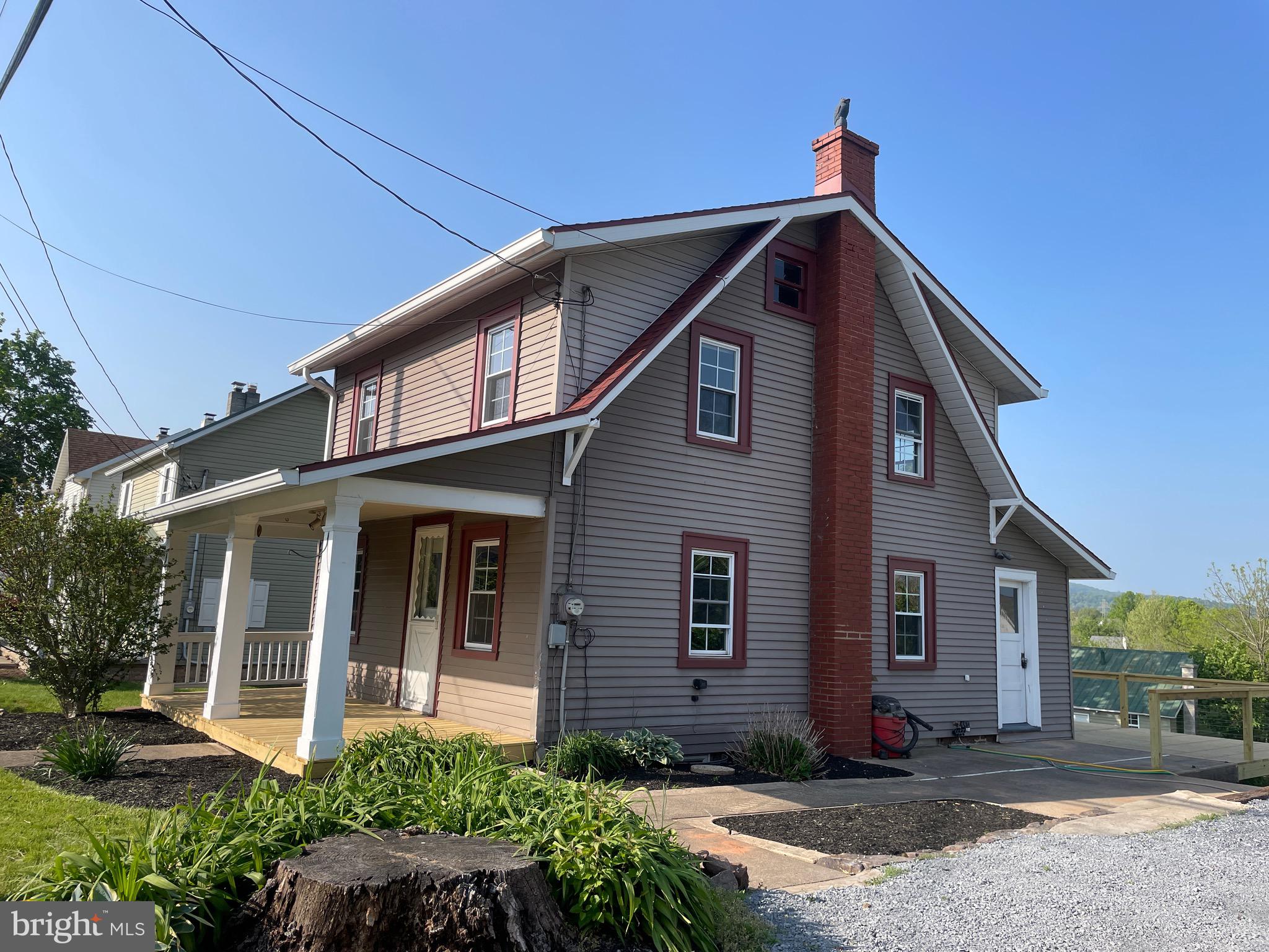 308 Highway 897 Reinholds, PA 17569 - Photo 6 of 36 a front view of a house with a yard