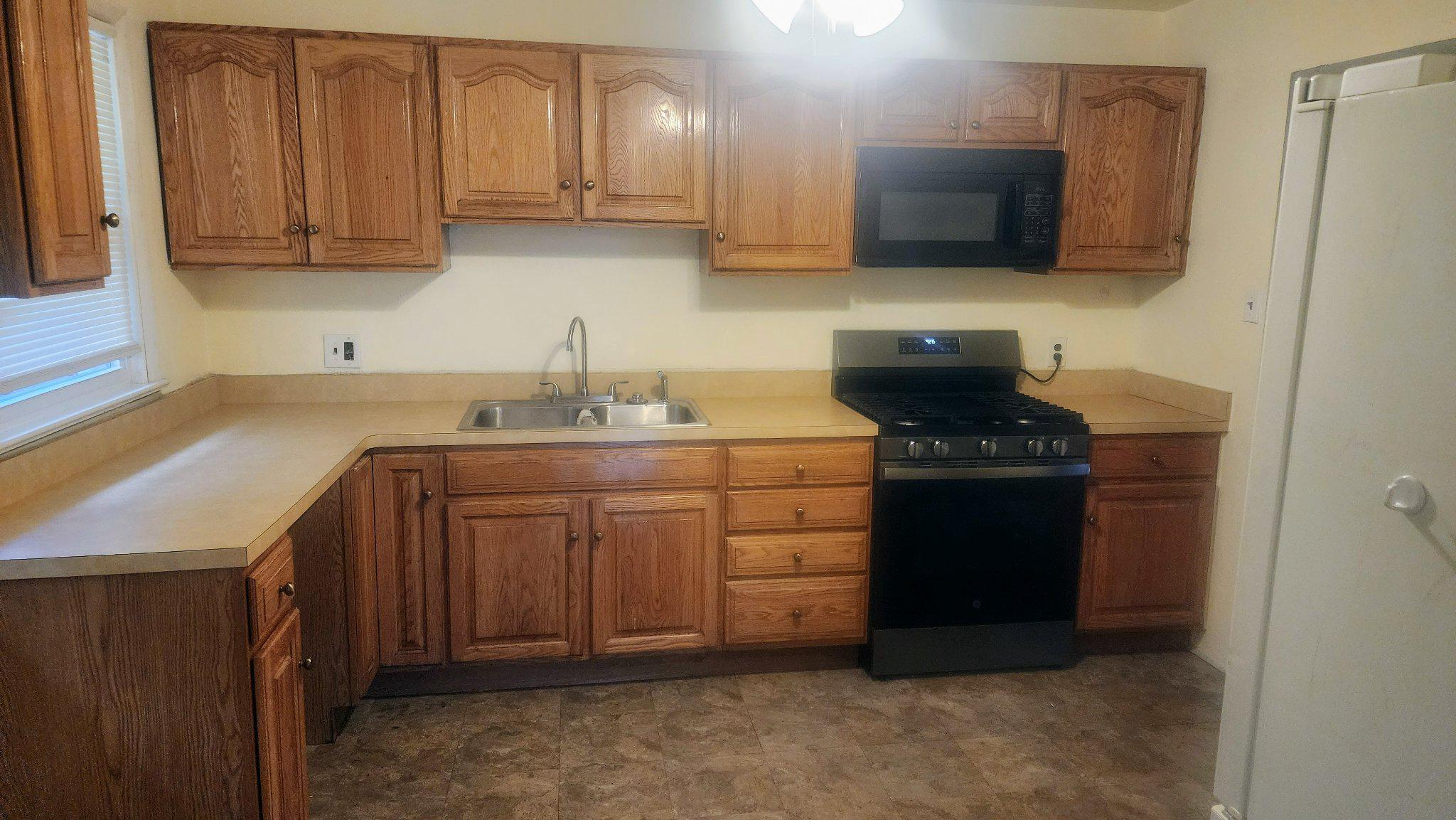 7612 Moores Road Brandywine, MD 20613 - Photo 7 of 15 Kitchen features new oven.