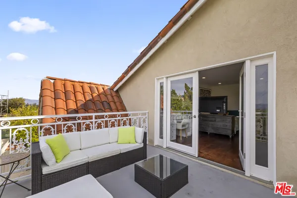 a balcony with hardwood