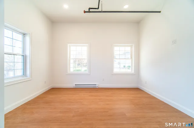 an empty room with windows