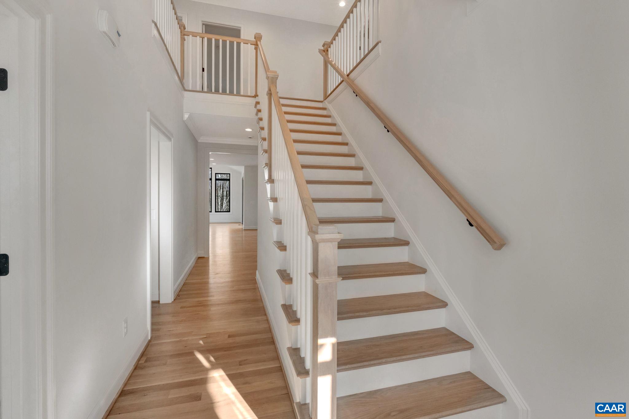 2534-4 Montgomery Ridge Road Charlottesville, VA 22911 - Photo 14 of 37 a view of a hallway with wooden floor and entryway