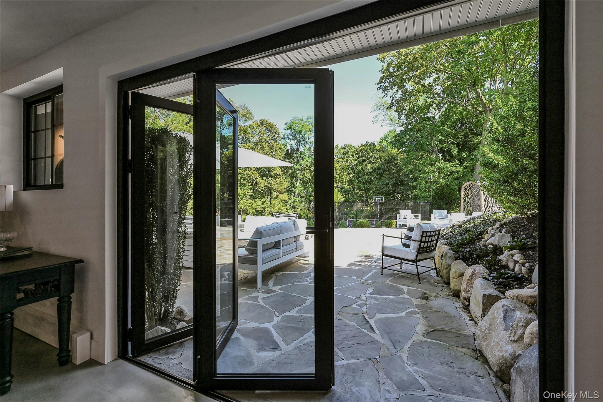 262 Huntington Bay Road Huntington Bay, NY 11743 - Photo 20 of 39 a balcony with chairs and with view of living room