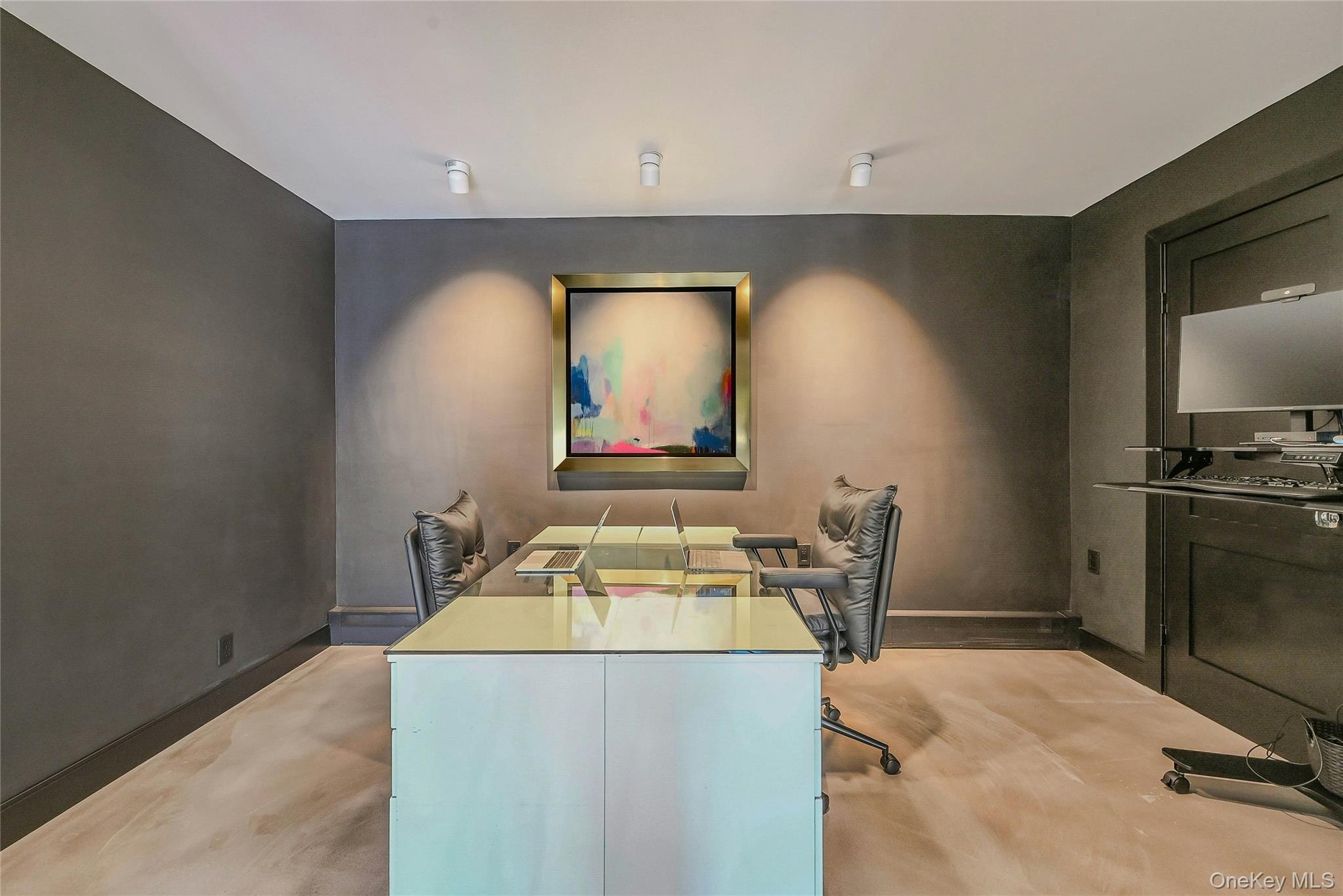 262 Huntington Bay Road Huntington Bay, NY 11743 - Photo 21 of 39 a room with a table chairs and a wooden floor