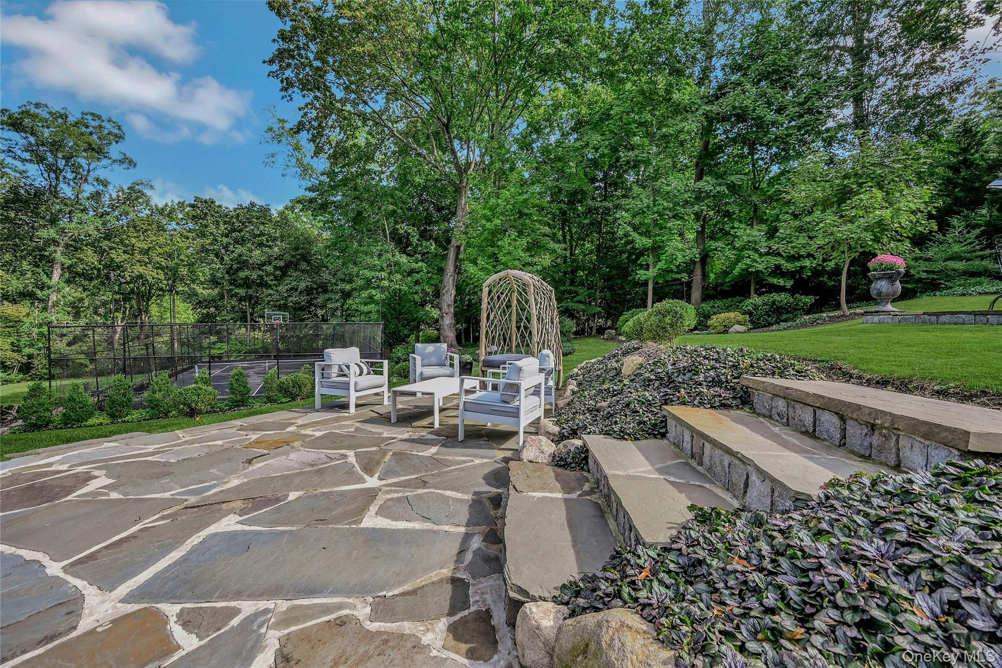 262 Huntington Bay Road Huntington Bay, NY 11743 - Photo 28 of 39 a view of a backyard with sitting area