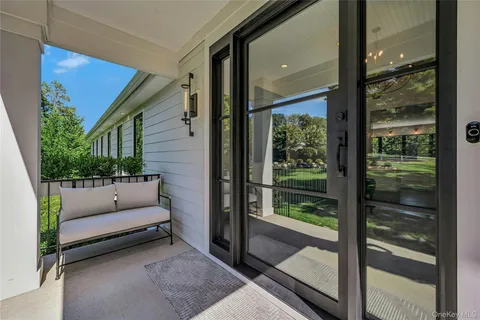 a view of a couches in the balcony