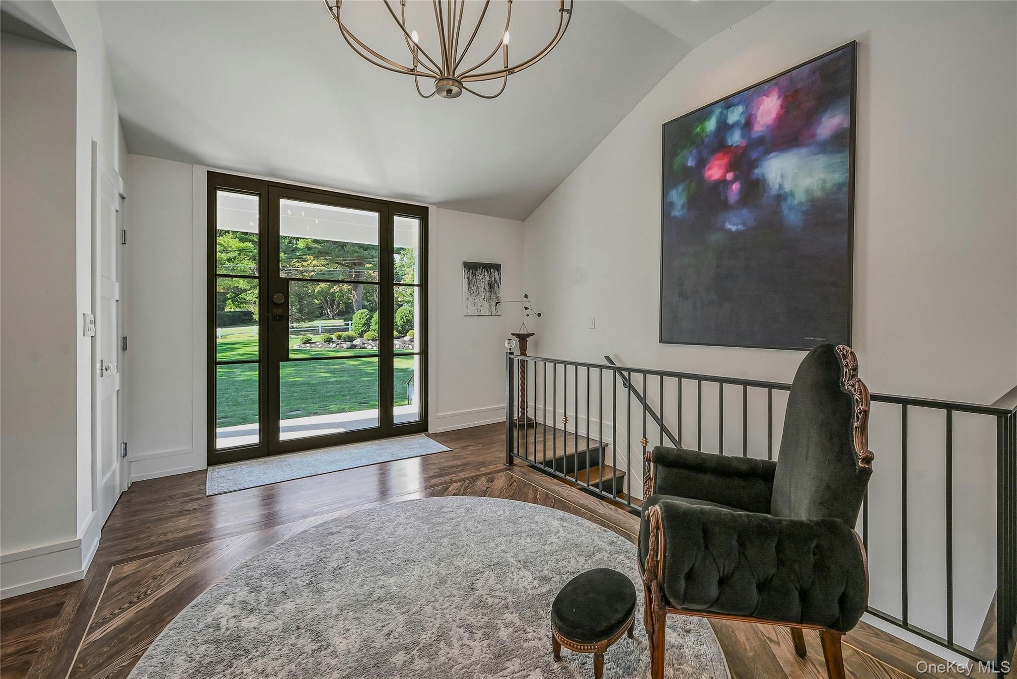 262 Huntington Bay Road Huntington Bay, NY 11743 - Photo 5 of 39 a view of a porch with wooden floor and windows