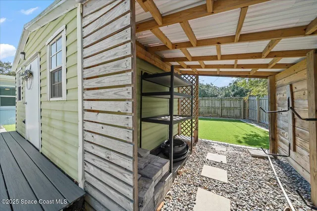 a view of a porch with a backyard