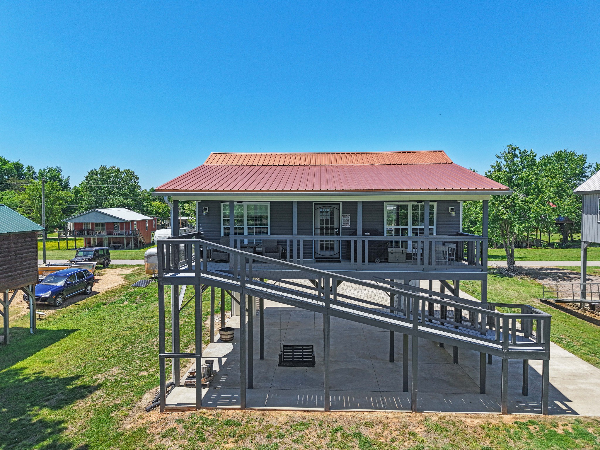 958 Pevahouse Camp Lane Decaturville, TN 38329 - Photo 29 of 32 a view of a house with a yard