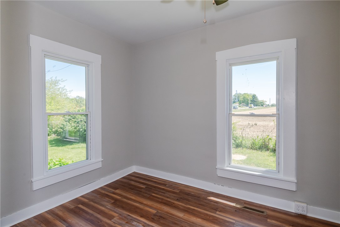 1217 Jasper Road Xenia, OH 45385 - Photo 33 of 62 This bright room features beautiful flooring and serene views through large windows.