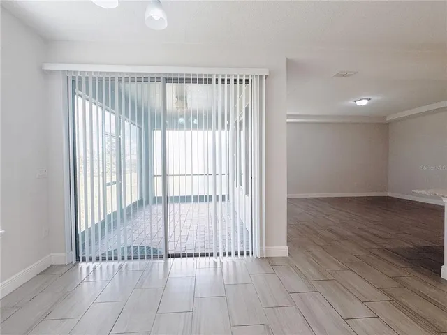 a bathroom with a double vanity sink a mirror and a shower